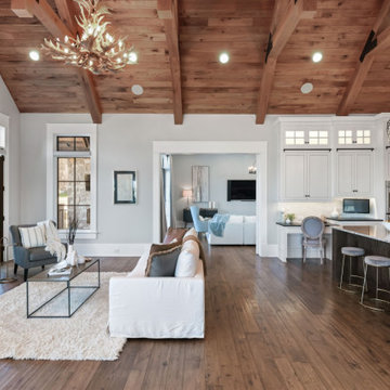 Modern Farmhouse Kitchen with Vaulted Wood-Beam Ceiling & Open-Concept Design