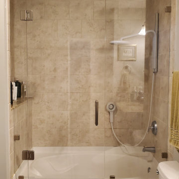 Frameless Glass-to-Glass Condo Enclosure on Tub with Window