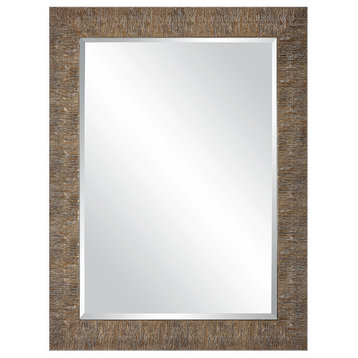 Heavily textured frame wall mirror in a golden champagne