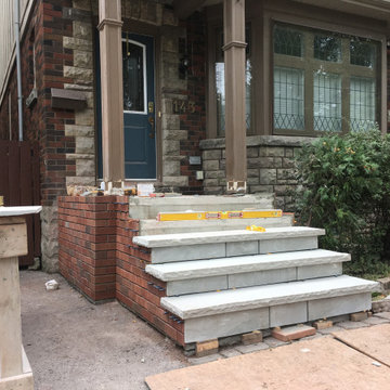 Masonry Stone Porch & Steps with Thin Veneer brick side Application.