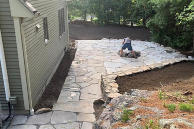 Patio - stone patio idea in Boston