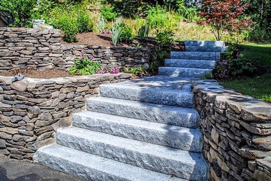 Stone wall and granite stair set install