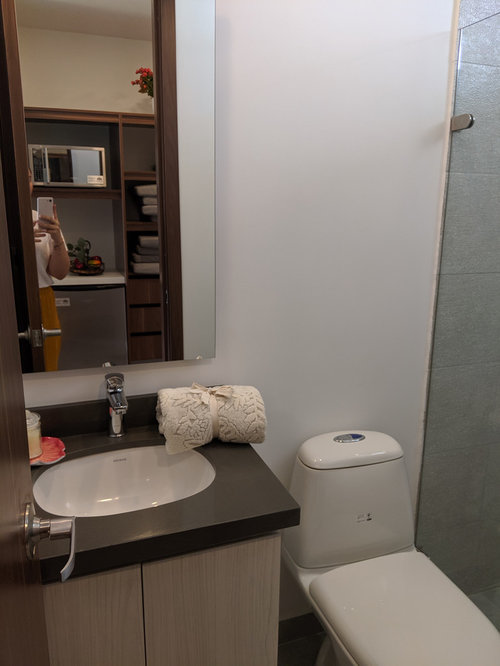how can I make my bathroom look bigger and elegant