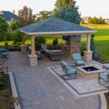 Medina Structure, Fireplace, Unilock Patio and Landscaping
