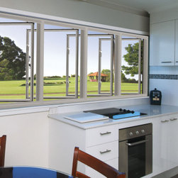 White Aluminium Casement Windows above a kitchen bench - Windows And Doors