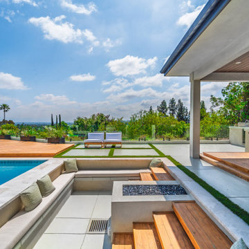 Covered Patio with Slatted Wood Ceiling and Outdoor Kitchen