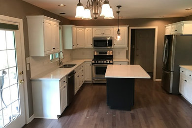 Example of a classic kitchen design in Other
