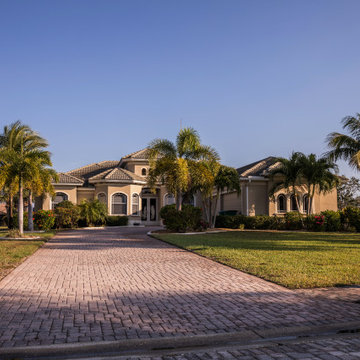Large Stucco Home in the Countryside With Palm Trees