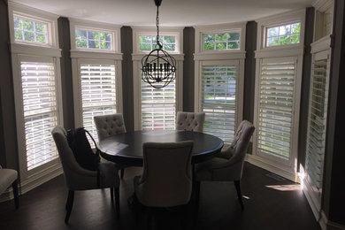 Example of a transitional dining room design in Detroit