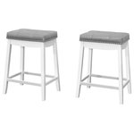 Monarch Specialties - Bar Stool, Set Of 2, Counter Height, Saddle Seat, Kitchen, Wood, White, Grey - Traditional design details give these barstools a timeless style. Upholstered in a grey leather-look fabric, the rectangular seats feature thick cushions with biscuit tufting that enhances the soft feel of the padding. Nailhead trim in a silver finish around the seats and curved aprons underneath further add to the classic, pub-like appeal of these counter-height chairs. Solid wood legs provide stability and are in a crisp, white finish, while footrests are ideally positioned to relax your feet. Sold as a set of 2, these stools have a space-saving, backless design that allows them to be tucked neatly underneath a kitchen island countertop or counter-height table when not in use.