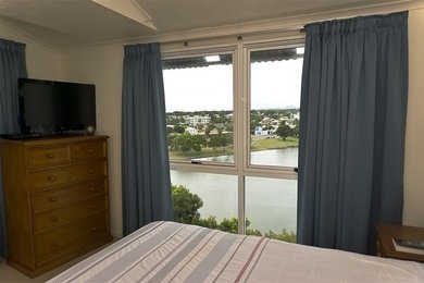 Inspiration for a beach style bedroom in Townsville.