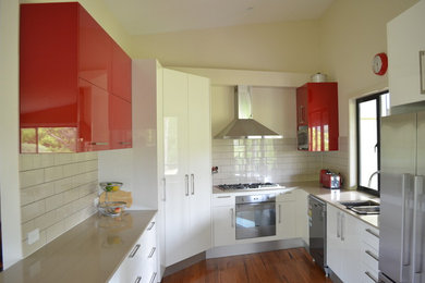 Inspiration for a modern kitchen in Brisbane with quartz benchtops.
