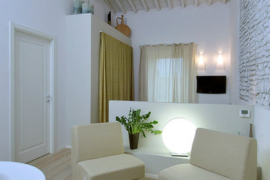 Example of a trendy family room design in Florence