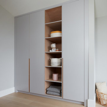 Modern Light Grey & White Oak Bedroom Closet with Open Storage