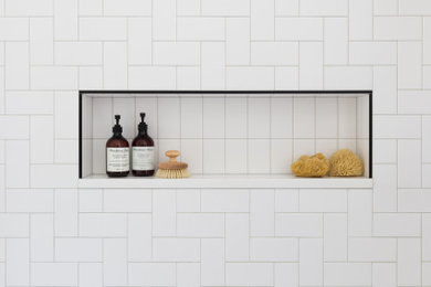 Example of a transitional bathroom design in Burlington