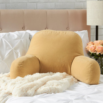 Neutral Colored Master Bedroom with Cream Bed Rest Pillow