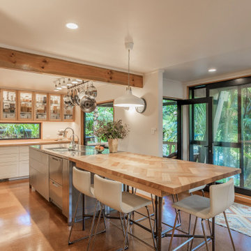 combo of stainless steel and timber benchtops, adding a touch of both sleek and 