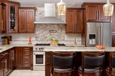 Example of a large transitional l-shaped ceramic tile and beige floor kitchen design in Bridgeport with an undermount sink, recessed-panel cabinets, dark wood cabinets, granite countertops, multicolored backsplash, matchstick tile backsplash, stainless steel appliances, an island and beige countertops
