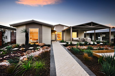 Example of a cottage exterior home design in Perth