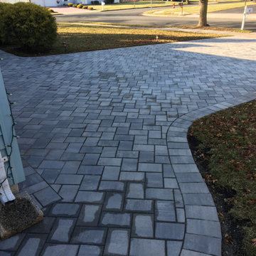 New paver Sidewalk for near stone Support columns