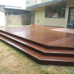 After Deck Repairs. Top Coated To Look Like Tigerwood Decking Without The Cost. - Outdoor Products