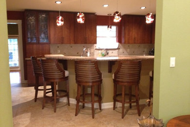 Example of a transitional kitchen design in Miami