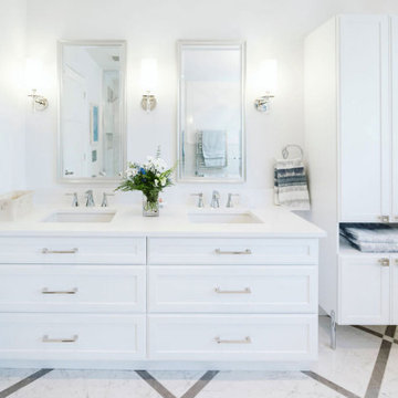 White double vanity and storage cabinets