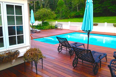 Inspiration for a modern backyard water fountain deck remodel in San Luis Obispo with no cover