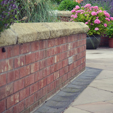 Stone/ brick etc landscape elements.