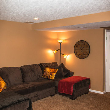 Finished basement with exercise area and small bath in Wexford, PA