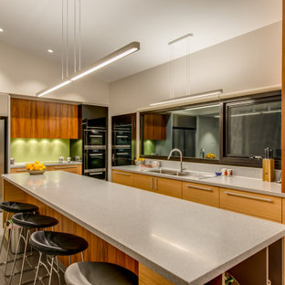 Design ideas for a contemporary galley kitchen pantry in Hobart with with island.