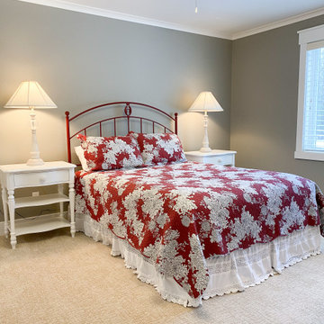 Guest Bedroom Red Metal Bed & Floral Print Bedding