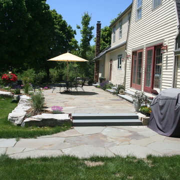 Limestone walls, water feature, flagstone patio