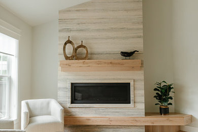 Example of a transitional light wood floor living room design in Toronto
