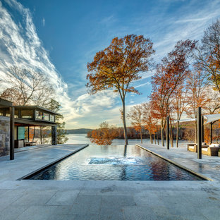 ニューヨークの大きい長方形コンテンポラリースタイルのおしゃれなプール (タイル敷き) の写真