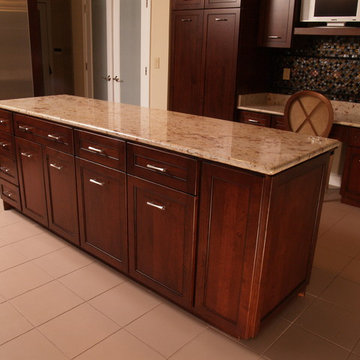 Contemporary Cherry Kitchen with Shaker Style and Granite counters in Bowie, MD