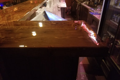 Example of a minimalist home bar design in Other