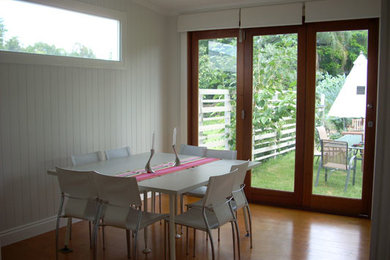 Design ideas for a contemporary dining room in Brisbane.