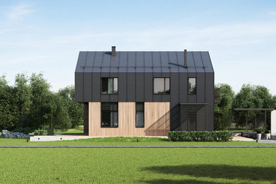 Пример оригинального дизайна: двухэтажный частный загородный дом среднего размера в современном стиле с комбинированной облицовкой, двускатной крышей и металлической крышей