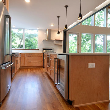 The kitchen features made-to-order pendants from Vermont