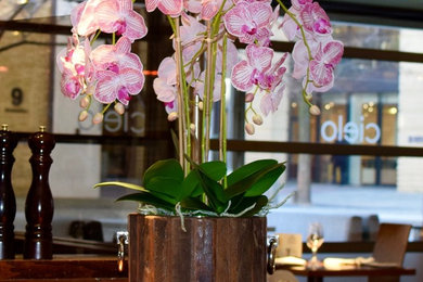 Artificial Pink and White Orchid Wine Cooler Display
