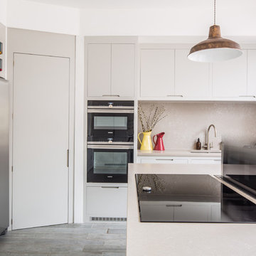Stylish Blue Accented Kitchen with Walk In Larder
