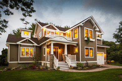 Mid-sized arts and crafts beige two-story concrete fiberboard gable roof photo in Philadelphia