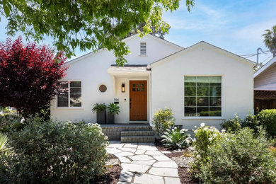Small craftsman white one-story stucco house exterior idea in San Francisco