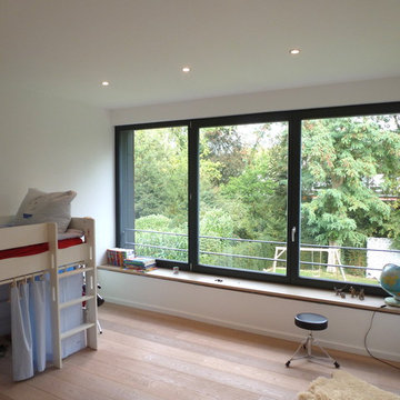 Dachgeschoßausbau in einem EFH u. Aufstockung eines Anbaus