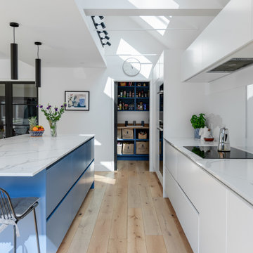 Bright white handleless kitchen in Hitchin