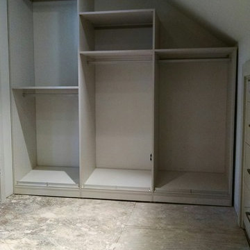 Contemporary Master Closet in high-gloss white and linen finish