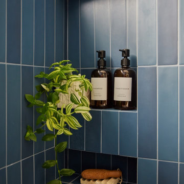 Floor-to-Ceiling Vertical Stacked Indaco Blue Tile with Built-In Niche