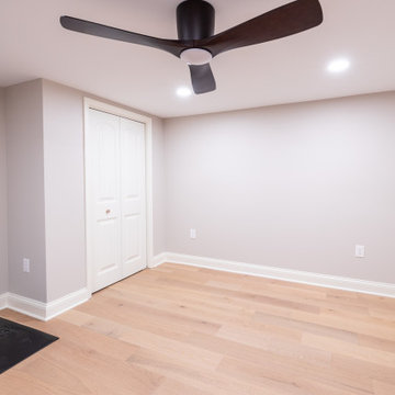 Family-Friendly Basement Remodel with Gym, Bar & Custom Entertainment Center