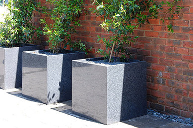 Granite Cube Planters on Residential Garden